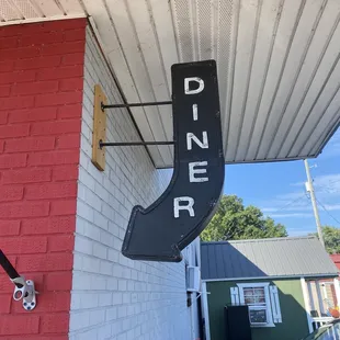 a sign for a diner