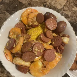 1lb shrimp, 1/2 lb sausage in CS sauce