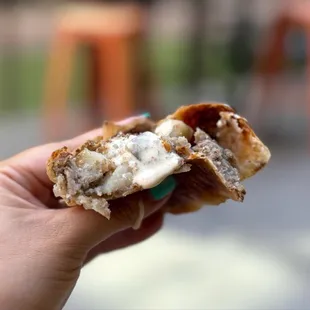 Cross-section: Classic Beef Empanada w/ potatoes | $7