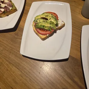 Toast with tomato and avocado