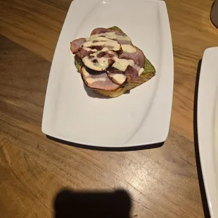 Toast with avocado and Canadian bacon