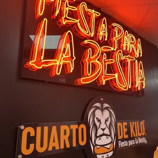 a neon sign for a mexican restaurant