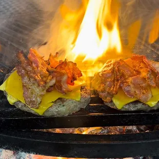 a hot dog on a grill