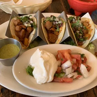 Tacos Al Pastor (Pork, pineapple, onion, cilantro, etc.)