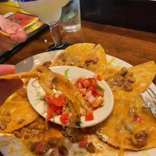 Soggy toasted corn tortilla (aka: Not-a-nacho)