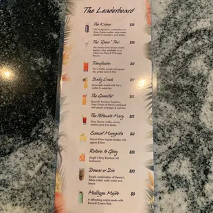  a menu on a marble table