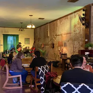 a group of people sitting at a table