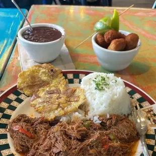 Ropa Vieja, white rice, black beans, tostones &amp; croquets