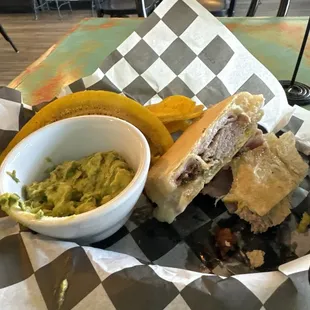 Great and friendly service. Delicious food. I got the 1/2 Cuban and the guacamole with plantain chips.  Clean and nice atmosphere.