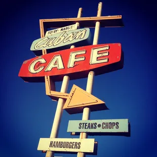 a neon sign for a restaurant