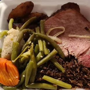 a meal in a styrofoam container