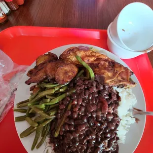 a plate of food on a tray