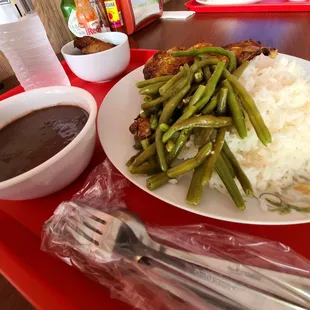 a plate of green beans and rice