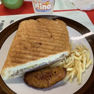 1/2 a Cuban sandwich. Sweet plantains and a lemonade.