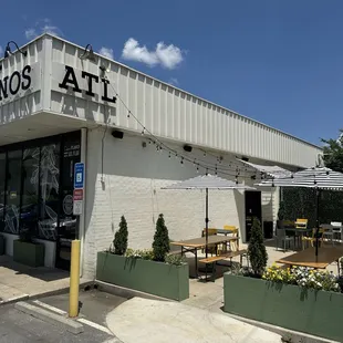 Sideview of the exterior highlighting the outdoor seating area