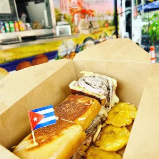 a cuban sandwich in a box