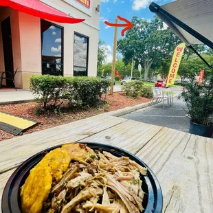 Pork Bowl with Congri rice with black beans and Tostines