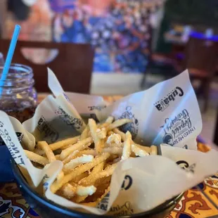 French Fries with a truffle oil and Parmesan cheese