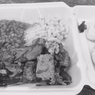a meal in a styrofoam container