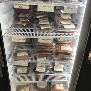 a refrigerator full of sausages