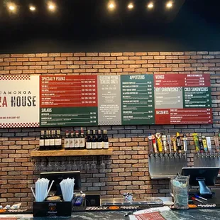menus on brick wall