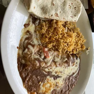 Burnt food and a mini burrito. $17