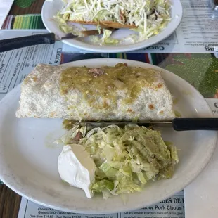 My beautiful wife is enjoying her big tostada and I am enjoying a nice wet chili verde burrito