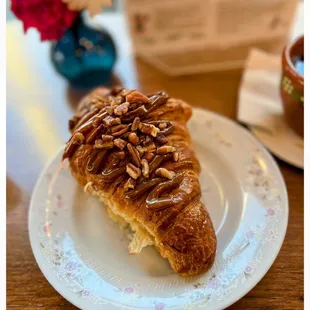 Croissant with Cajeta (dulce de leche). The Cajeta is on top and within the Croissant (not overpowering).