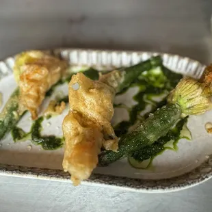 Tempura fried goat cheese stuffed squash blossom