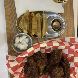 Soy garlic wings, dumplings, and side of pickle daikon