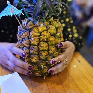 Cocktail in a Pineapple. SOOOO yum!!!