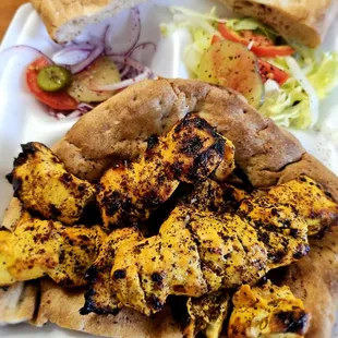 Skewered chicken with naan