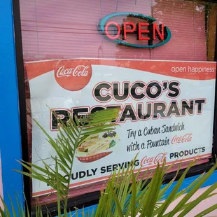 a sign for cuco's restaurant