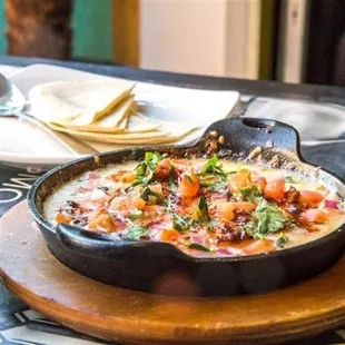 a bowl of mexican food