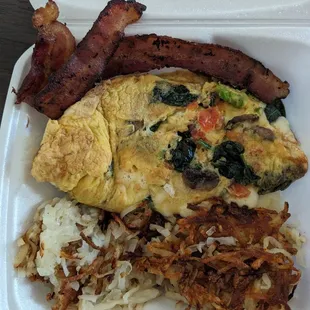 Garden of eatin omelette, hash browns &amp; bacon.