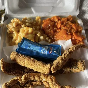 a meal in a styrofoam container