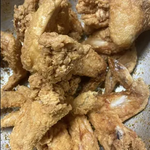 fried chicken in a frying pan