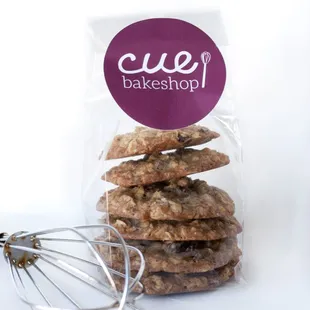 a bag of cookies with a whisk