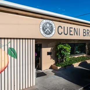 The front of our building features the largest Dunedin Orange Steve Spathelf ever painted.