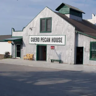 a white building with green trim