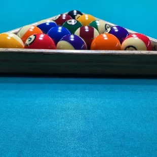 a billiards triangle on a pool table