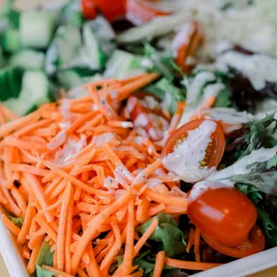 Lecce Salad with fresh spring mix , fresh carrots, cucumbers, tomatoes , mozerella cheese and home made ranch.