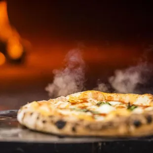 a pizza being cooked