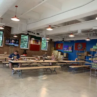 two people sitting at picnic tables