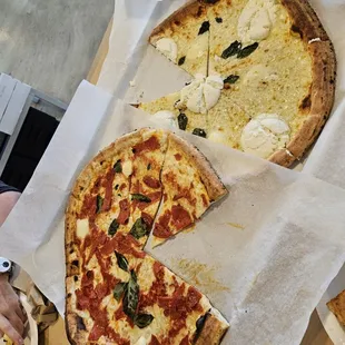 White pizza and peperoni pizza.