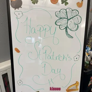 St. Patrick's Day signage in lobby.