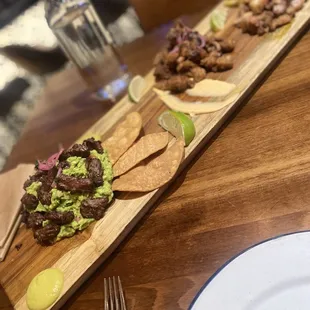 Tabla de chicharrones (arracherra, pulpo, pork belly)