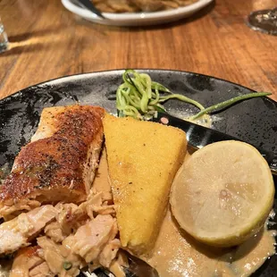 This is salmon with zucchini, polenta, and lemon.