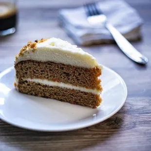 Carrot Cake - Very moist, lightly spiced and finished with delicious cream cheese frosting.