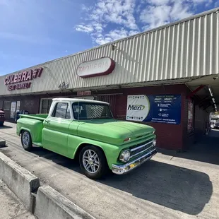 green truck parked in front